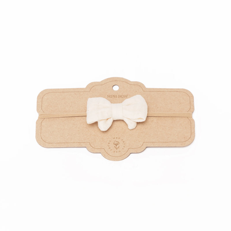 Mrs Ertha Little Bow Headband - Vanilla Swanky Boutique Malta